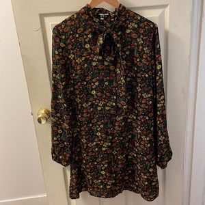 Black floral long sleeve dress with lining and bow at neckline